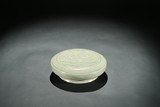 A YUE WARE CELADON GLAZED 'PHOENIX' COVER BOX