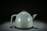 A RU-TYPE CELADON GLAZED TEAPOT AND COVER