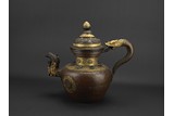 A LARGE TIBETAN BRONZE GILT DECORATED RITUAL WATER VESSEL