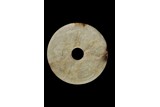 A JADE CARVED DISC BI