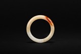 A CARNELIAN JADE BANGLE