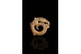 A JADE CARVED 'MYTHICAL BEAST' ORNAMENT