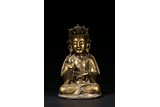 A GILT BRONZE FIGURE OF SEATED BODHISATTVA