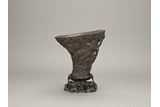 AN AGARWOOD 'LANDSCAPE' LIBATION CUP WITH STAND