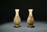 A PAIR OF SMALL JADE 'DIAMOND SUTRA' VASES