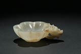 A WHITE JADE LOBED 'DRAGON' WASHER