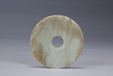 A CELADON JADE DISC BI