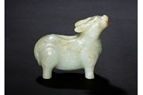 A WHITE JADE ARCHAISTIC TAPIR-FORM VESSEL