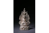 AN INDIAN BRONZE CAST BUDDHA FIGURE