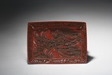A CINNABAR LACQUER LANDSCAPE RECTANGULAR DISH