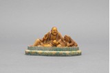 A SOAPSTONE CARVING OF LUOHAN AND DRAGON