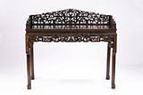 A ZITAN OR HARDWOOD CARVED DRESSING TABLE