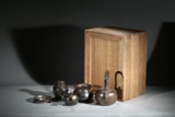 A SET OF FOUR TEAPOT AND VESSELS