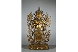 A GILT-BRONZE FIGURE OF AMITAYUS