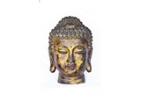 A LARGE GILT-BRONZE HEAD OF SHAKYAMUNI BUDDHA