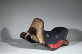 A GILT-BRONZE HORSE SADDLE