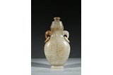 A CARVED WHITE JADE VASE AND COVER