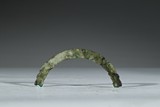 A CARVED GREYISH-GREEN JADE 'DRAGON' HUANG