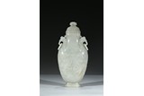A WHITE JADE 'PHOENIX' VASE AND COVER