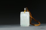 A CARVED WHITE JADE 'LANDSCAPE AND POEM' PENDANT