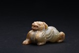 AN ARCHAIC JADE FIGURE OF A QILIN