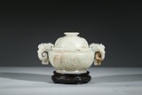 A CARVED WHITE JADE CENSER AND COVER