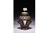 A SILVER JADE AND AGATE INLAID VASE WITH COVER
