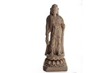 A STONE CARVING OF STANDING BODHISATTVA