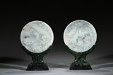 A PAIR OF JADE CARVED CIRCULAR 'LANDSCAPE' TABLE SCREENS