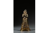 A GILT BRONZE TURQUOISE-BEAD INLAID STANDING BODHISATTVA 