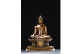 A BRONZE FIGURE OF SEATED BODHISATTVA