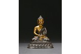 A BRONZE FIGURE OF AMITABHA