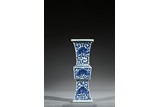 A BLUE AND WHITE 'FLORAL' ZUN VASE