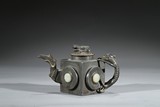A BRONZE JADE INLAID TEAPOT AND COVER