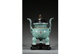 A LARGE FAMILLE ROSE GREEN GROUND TRIPOD CENSER 