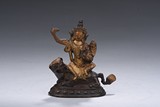 A COLD GILT FIGURE OF MANJUSRI