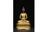 A GILT-BRONZE FIGURE OF AMITABHA
