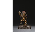 A BRONZE FIGURE OF VAJRAVARAHI