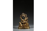 A GILT BRONZE FIGURE OF DEITY WITH CONSORT
