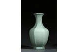 A LARGE AND RARE MOULDED CELADON GLAZE HEXAGONAL VASE