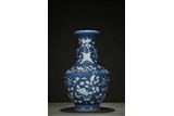 A BLUE AND WHITE RESERVE-DECORATED 'FLOWER' VASE