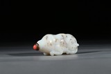 A WHITE JADE DOG SHAPED SNUFF BOTTLE