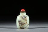 A CELADON JADE SNUFF BOTTLE