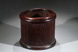 A ROSEWOOD BAMBOO-FORM SCROLL POT