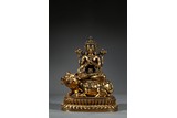 A GILT BRONZE FIGURE OF BODHISATTVA