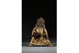 A GILT BRONZE FIGURE OF MAHAKALA