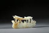 A CARVED JADE MODEL OF BOAT