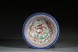 A RARE SANCAI GLAZE 'DRAGONS' STEM DISH