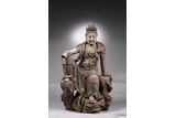 A LARGE CARVED WOOD FIGURE OF GUANYIN