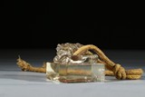 A CRYSTAL CARVED 'DRAGON' SEAL